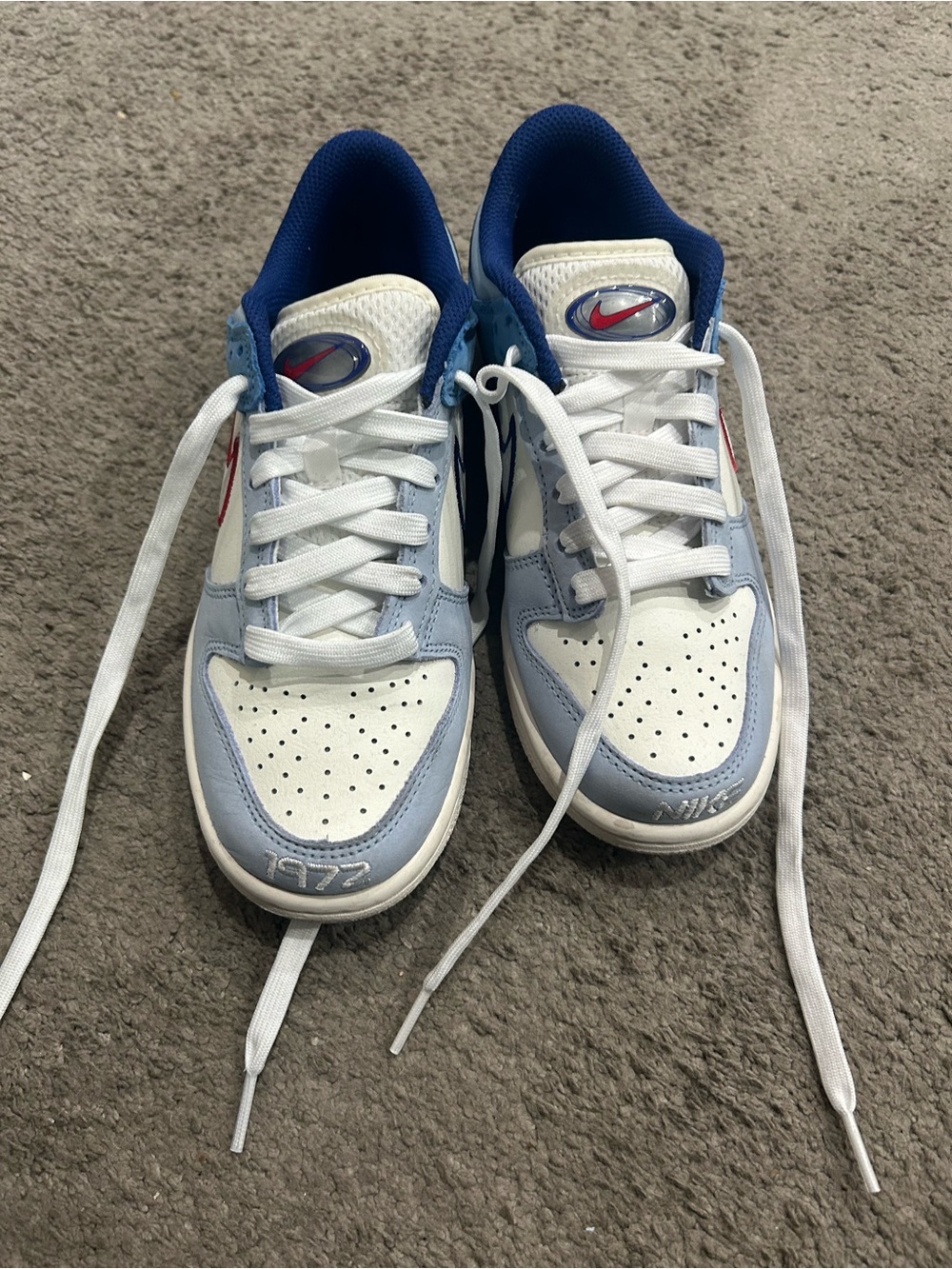 Nike White and Light Blue Low-Top Athletic Sneakers with Navy Lining